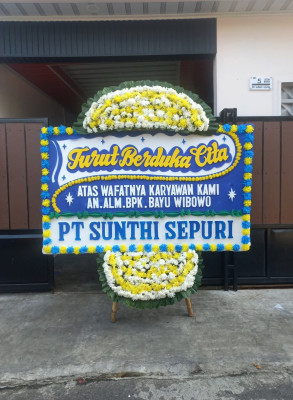 Papan Bunga Duka di Poom