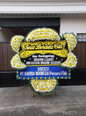 Papan Bunga Duka di Poom