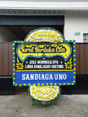 Papan Bunga Duka di Poom