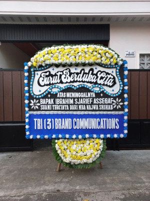 Papan Bunga Duka di Poom